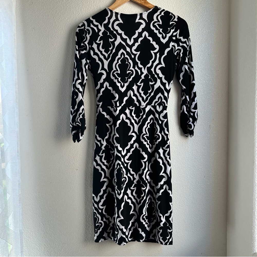 White House Black Market | Black and White Patterned Faux Wrap Mini Dress - Picture 3 of 8